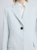 Proenza Schouler Detail image of model wearing the Eva Jcket in Cotton Viscose Suiting in Pale Grey
