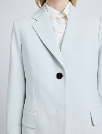 Proenza Schouler Detail image of model wearing the Eva Jcket in Cotton Viscose Suiting in Pale Grey
