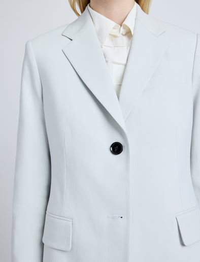 Proenza Schouler Detail image of model wearing the Eva Jcket in Cotton Viscose Suiting in Pale Grey