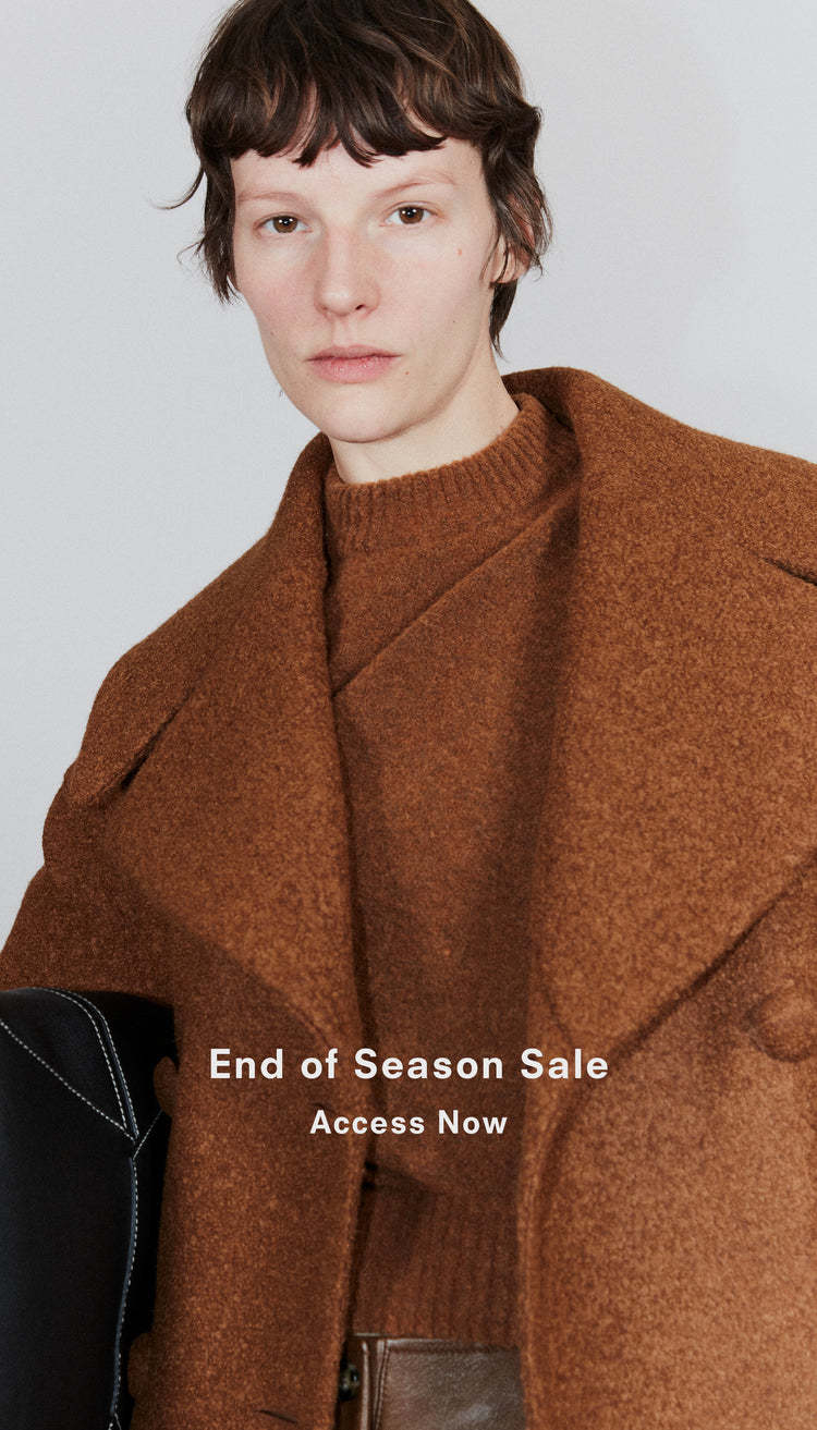 Cropped image of model in Double Face Llama Wool Coat in umber