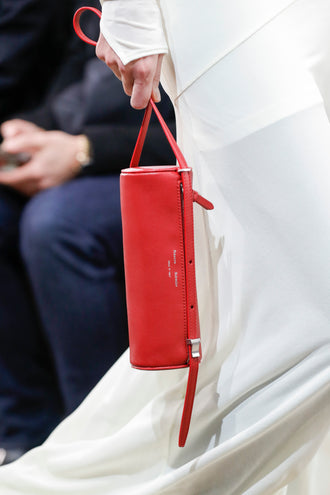 Image of model walking Proenza Schouler Fall Winter 2024 Runway wearing Silo Bag in rosewood