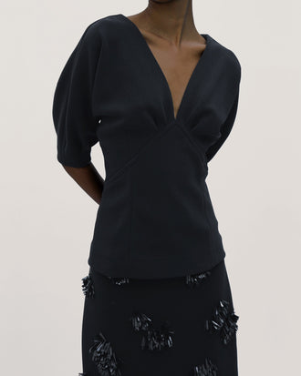 Proenza Schouler Detail image of model wearing Darena Top in Compact Stretch Crepe in Black