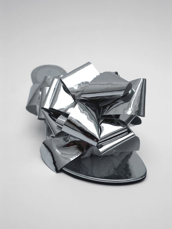 Proenza Schouler 3/4 Front image of Tee Souvenir Sandals in Mirror Foil in Silver