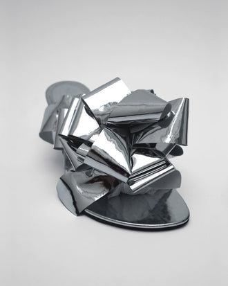 Proenza Schouler 3/4 Front image of Tee Souvenir Sandals in Mirror Foil in Silver