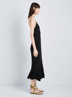 Proenza Schouler Full Length Side Image of model wearing Giuditta Dress in Viscose Ribbed Godet in Black