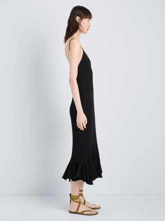 Proenza Schouler Full Length Side Image of model wearing Giuditta Dress in Viscose Ribbed Godet in Black