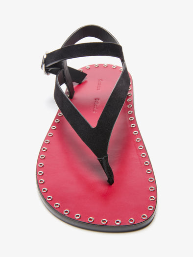 Proenza Schouler Detail Image of Grommet thong sandals in calfsuede in Black