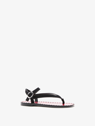 Proenza Schouler Side Still Life Image of Grommet thong sandals in calfsuede in Black