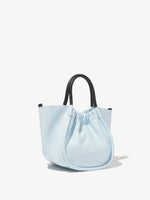 Side image of Small Ruched Crossbody Tote in PALE BLUE