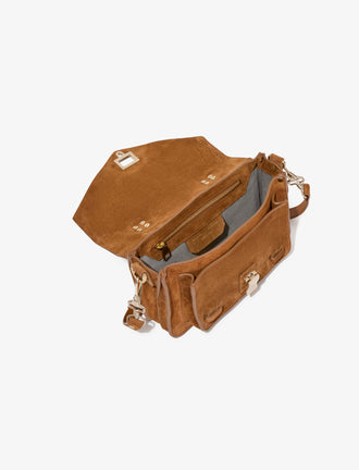 Proenza Schouler aerial image of PS1 Tiny Bag In Soft Suede in saddle