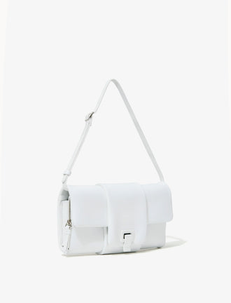Side image of Flip Shoulder Bag in Optic White with strap