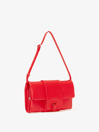 Side image of Flip Shoulder Bag with strap in red
