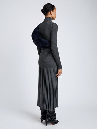 Proenza Schouler Image of model wearing Slide Bag in Soft Suede in Dark Navy