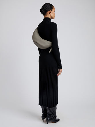 Image of model wearing Slide Bag in Soft Pebbled Calf in Slate