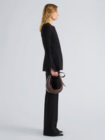 Proenza Schouler Image of model wearing Slide Bag in Pull Up Calf in Dark Brown