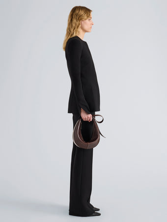 Proenza Schouler Image of model wearing Slide Bag in Pull Up Calf in Dark Brown
