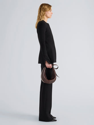 Proenza Schouler Image of model wearing Slide Bag in Pull Up Calf in Dark Brown