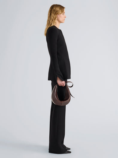 Proenza Schouler Image of model wearing Slide Bag in Pull Up Calf in Dark Brown