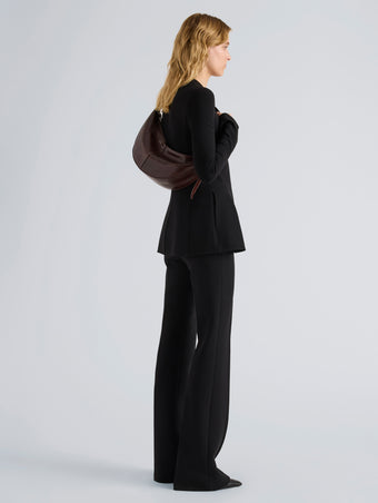 Proenza Schouler Image of model wearing Slide Bag in Pull Up Calf in Dark Brown