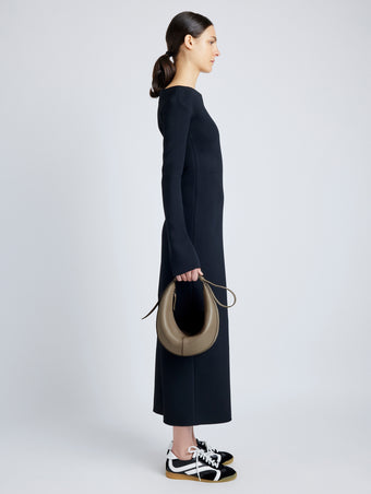 Proenza Schouler image of model wearing Slide Bag in LIGHT TAUPE