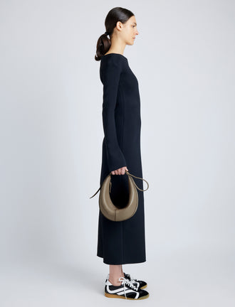 Proenza Schouler image of model wearing Slide Bag in LIGHT TAUPE