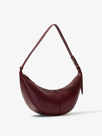 Proenza Schouler side image of Slide Bag in DARK RED