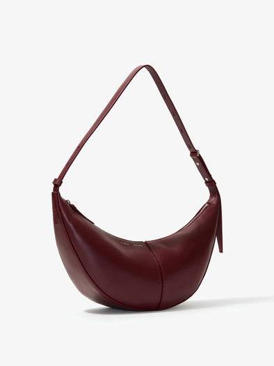 Proenza Schouler side image of Slide Bag in DARK RED
