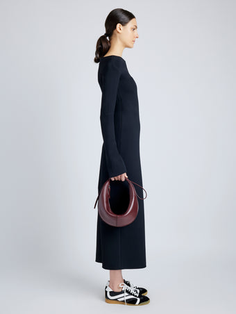 Proenza Schouler image of model wearing Slide Bag in DARK RED