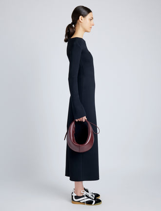 Proenza Schouler image of model wearing Slide Bag in DARK RED