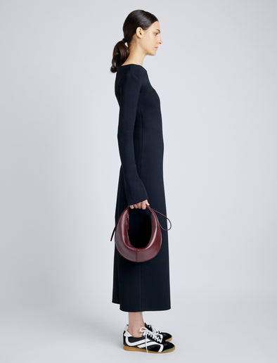 Proenza Schouler image of model wearing Slide Bag in DARK RED