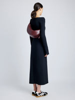 Proenza Schouler image of model wearing Slide Bag in DARK RED