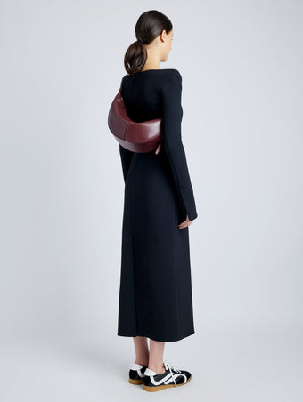 Proenza Schouler image of model wearing Slide Bag in DARK RED