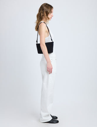 Image of model wearing Bond Bag in Suede in Chocolate