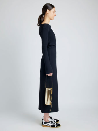 Image of model wearing Silo Bag in Soft Mirrored Fabric in LIGHT GOLD