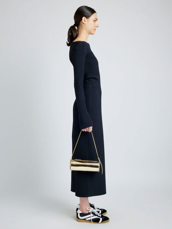 Image of model wearing Silo Bag in Soft Mirrored Fabric in LIGHT GOLD