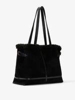 Proenza Schouler side image of Days Tote in Shearling Backed Suede in black