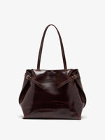 Proenza Schouler Front image of Days Tote in Pull Up Calf Skin in Dark Brown with sides cinched
