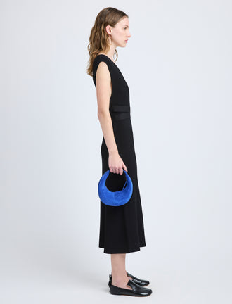 Image of model wearing Mini Slide Bag in Soft Suede in Cobalt