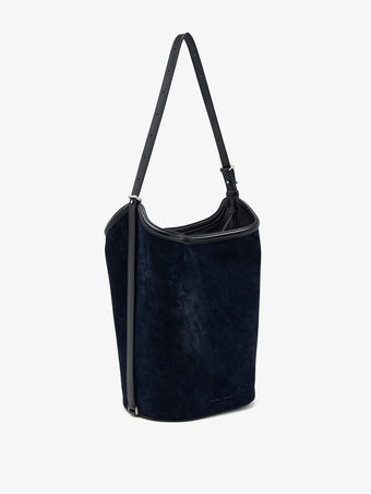 Proenza Schouler Side image of Brant Bucket Bag in Soft Suede in Dark Navy