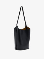Proenza Schouler side image of Brant Bucket Bag in Smooth Calf in black