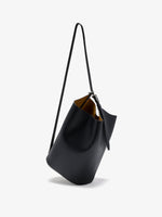 Proenza Schouler crossbody image of Brant Bucket Bag in Smooth Calf in black