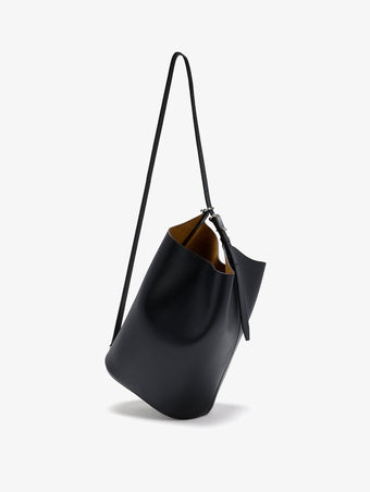 Proenza Schouler crossbody image of Brant Bucket Bag in Smooth Calf in black