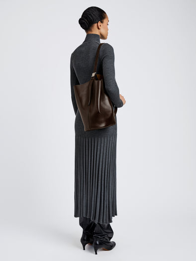 Proenza Schouler Image of model wearing Brant Bucket Bag in Smooth Calf in Chocolate