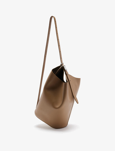 Front crossbody image of Brant Bucket Bag in Smooth Calf in Cumin