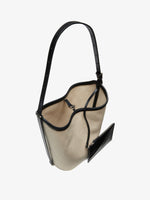 Proenza Schouler interior image of Brant Bucket Bag in Natural Linen in natural/black