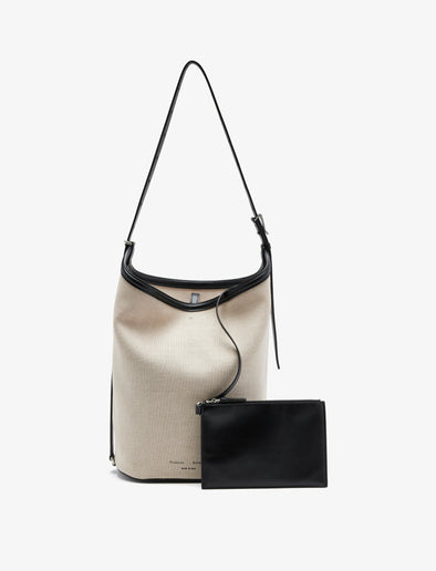 Proenza Schouler front image of Brant Bucket Bag in Natural Linen in natural/black with pouch removed