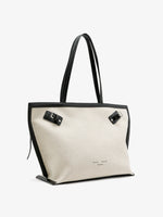 Proenza Schouler front 3/4 image of Days Tote in Natural Linen in natural/black