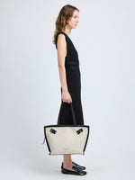 Proenza Schouler image of model wearing Days Tote in Natural Linen in natural/black