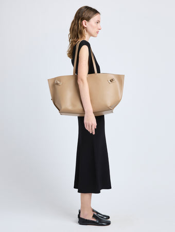 Image of model wearing Days Carryall in Smooth Calf in Cumin