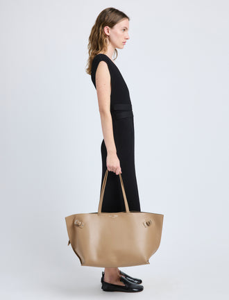 Image of model wearing Days Carryall in Smooth Calf in Cumin